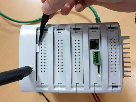 Inserting the SIM card on Raspberry Pi PLC Inserting the SIM card on Raspberry Pi PLC